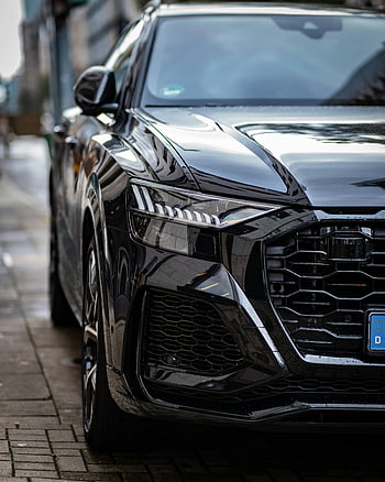 black automobile, front view, sleek black car, luxury car, urban setting, parked car, black car, car front, urban car, luxury automobile, black vehicle