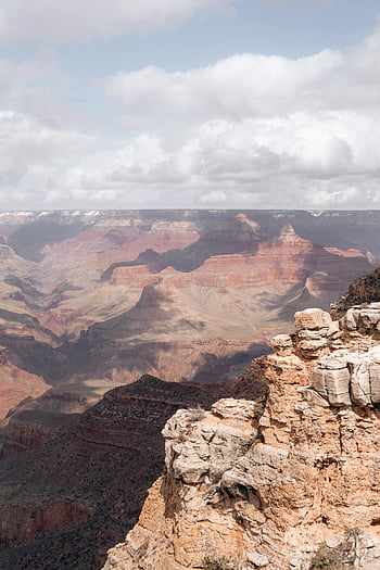 Grand Canyon, United States of America, layered landscapes, cloudy sky, breathtaking view, natural wonder, scenic beauty, outdoor adventure, national park, Arizona, USA