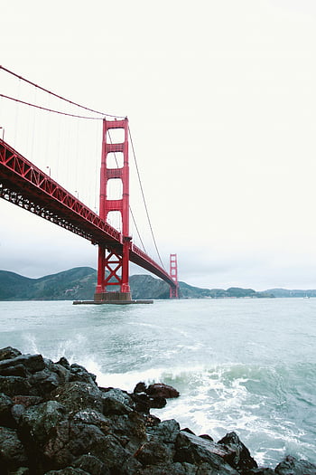 Golden Gate Bridge, San Francisco, overcast day, ocean view, iconic landmark, suspension bridge, red bridge, coastal scenery, bay area, California, waterfront