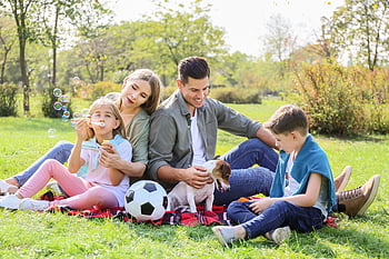 family, portrait, outside, father, son, mother, daughter, dog, smiling, park, picnic