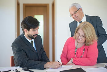 real estate, senior couple, signing documents, real estate agent, modern office, real estate transaction, property purchase, real estate consultation, real estate documents, real estate signing, senior clients