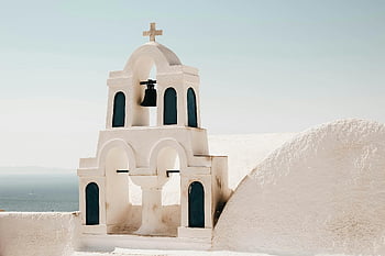 white concrete church, cross on top, bell tower, clear blue skies, Santorini, Greece, iconic church, white church, bell tower with cross, white architecture, Mediterranean architecture