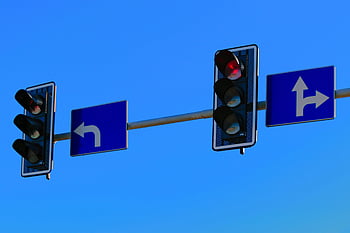 traffic lights, red light, directional road signs, clear day, blue skies, traffic signal, road sign, traffic control, street sign, traffic management, traffic regulation