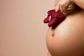 pregnant woman, red baby shoes, belly, anticipation, love, close-up, baby shoes, pregnancy, motherhood, maternity, red shoes