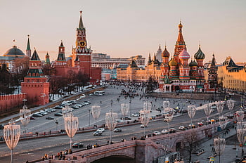 Moscow cityscape, St. Basil's Cathedral, Kremlin, traditional cathedrals, historic architecture, panoramic view, sunset, Red Square, Russian landmarks, Moscow skyline, city architecture