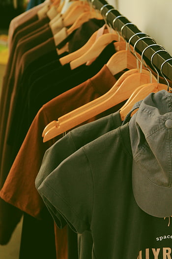 clothes, wooden hangers, clothing rack, modern streetwear, shirts, fashion store, streetwear shirts, wooden hangers rack, fashion clothing, store display, t-shirts