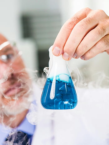 scientist, Erlenmeyer flask, blue liquid, lab experiment, smoke, close-up view, holding flask, laboratory, chemical reaction, scientific research, experiment