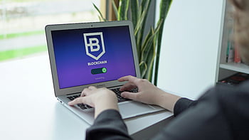 laptop, blockchain application, modern technology, hands on keyboard, close-up, person using laptop, blockchain, technology, computer, workspace, indoor setting