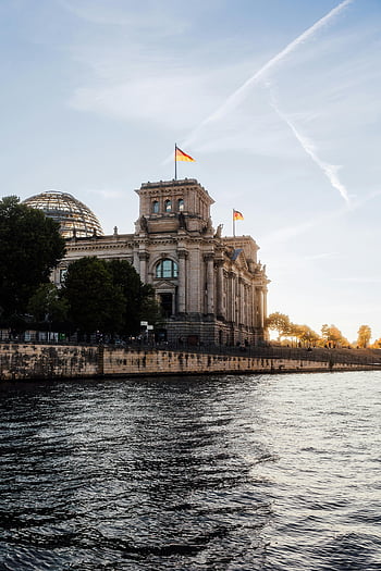 Bundestag, Reichstag Building, Berlin, Germany, sunset, river view, German flag, historic architecture, cityscape, dome, landmark