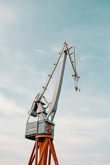construction site, cranes, city, tall industrial crane, clear blue sky, modern construction technology, industrial technology, construction equipment, urban development, building industry, construction machinery