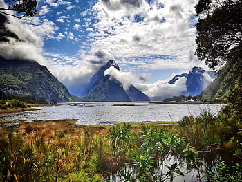 lake, rocks, water, sea, fiord, sound, mountains, clouds, sky, blue, trees