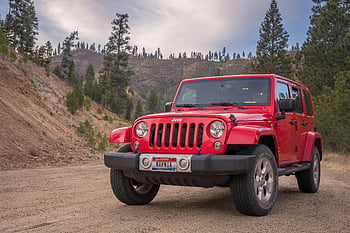 Red Jeep, dirt road, mountainous forest, travel themes, adventure themes, outdoor vehicle, off-road vehicle, natural landscape, travel photography, adventure photography, scenic backdrop