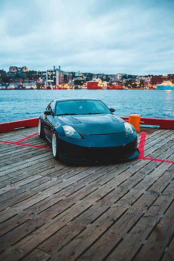 นิสสัน 350z, รถสปอร์ต, ท่าเรือไม้, เส้นขอบฟ้าของเมือง, ฉากหลัง, ริมน้ำ, ภาพรถ, นิสสัน, เจือ, cityscape