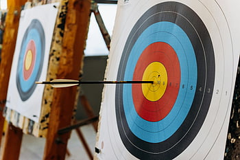 arrow, bullseye, colorful target, indoor archery range, archery, target practice, precision shooting, archery target, bull's eye, arrow hit, archery range