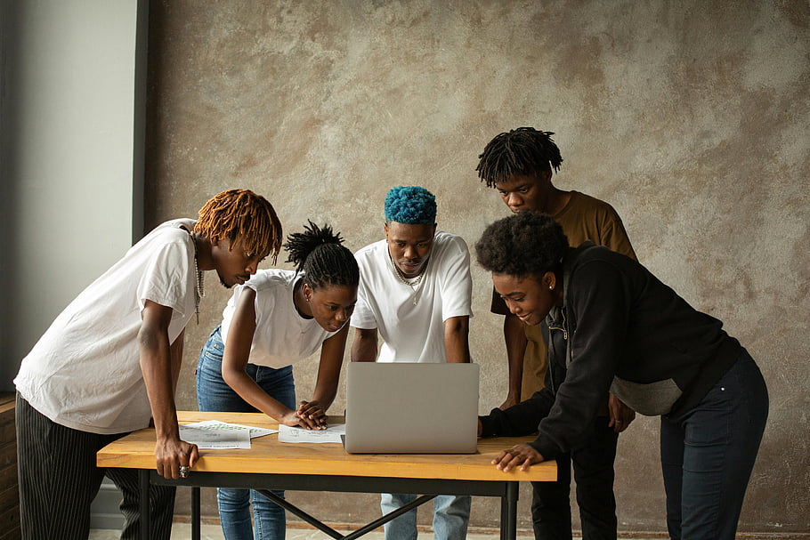 colleagues, laptop, teamwork, innovation, young adults, collaboration, indoor, group, desk, office, people