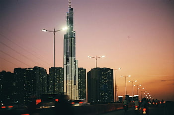 punto di riferimento 81, grattacielo, saigon, Vietnam, Ho Chi Minh City, skyline urbano, vista al tramonto, paesaggio urbano, alti edifici, luci della sera, Città vibrante