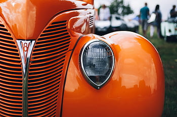 mobil vintage oranye, kendaraan oranye klasik, fotografi fokus selektif, Lampu Mobil Vintage, Kisi -kisi mobil vintage, latar belakang kabur, tampilan terperinci, mobil oranye, mobil kuno, mobil klasik, pameran mobil