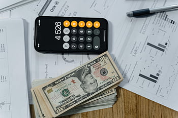 cash money, calculator, white paper printout, mobile calculator, financial documents, business planning, desk, financial planning, money management, cash on desk, financial tools