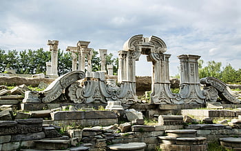 Ruins of the Old Summer Palace, Beijing, China, historical architecture, Chinese culture, intricate stone ruins, historical site, ancient ruins, cultural heritage, Beijing landmarks
