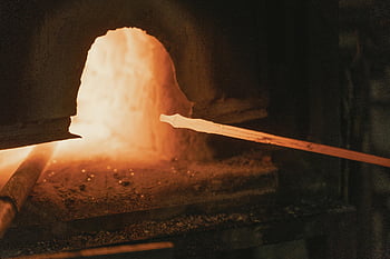 melting steel, traditional blacksmith, forge, heated steel, close-up view, blacksmith's forge, steel forging, glowing metal, metalworking, furnace, hot steel