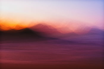 sunset, mountains, colorful abstract, dreamy hues, surreal scene, landscape, blurry photograph, vibrant colors, nature photography, scenic view, outdoor scenery