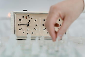 chess, chess clock, player's hand, moving piece, game intensity, chess game, chessboard, chess pieces, chess timer, chess strategy, chess player