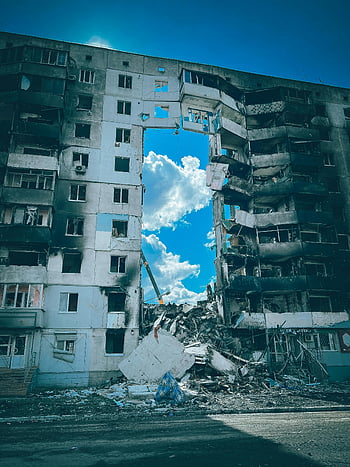 destroyed residential building, Borodyanka, Kyiv Oblast, war damage, Ukraine conflict, building ruins, urban destruction, war-torn city, damaged architecture, conflict zone, debris pile