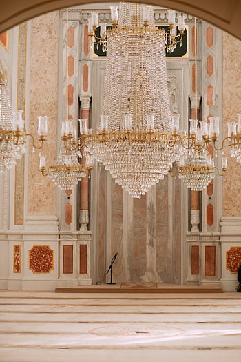 Crystal chandeliers, historic Istanbul mosque, ornate design, Muslim culture, stunning chandelier, interior design, religious architecture, Islamic art, cultural heritage, mosque interior, chandelier lighting