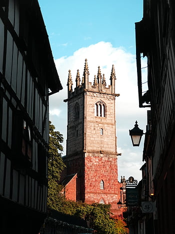 historic church tower, Shrewsbury, England, Gothic-style, Tudor architecture, church architecture, medieval church, historic building, Shrewsbury landmarks, church spire, historic site