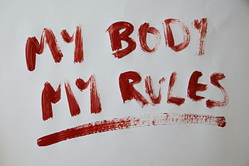 empowerment, My Body My Rules, red paint, white background, bold statement, body autonomy, feminist message, empowerment quote, self-determination, body rights, activism