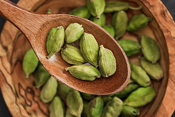 cardamom, wooden spoon, fresh herbs, rustic bowl, culinary themes, green cardamom, close-up shot, cooking ingredients, spice, natural ingredients, wooden utensils