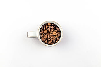 coffee beans, white ceramic mug, overhead shot, roasted coffee beans, white ceramic cup, plain background, coffee, ceramic mug, coffee cup, roasted beans, white mug