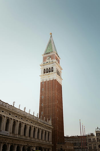 St. Mark's Campanile, Venice, Italy, clear sky, elegant view, historic tower, Venetian architecture, St. Mark's Square, bell tower, European landmarks, travel destination