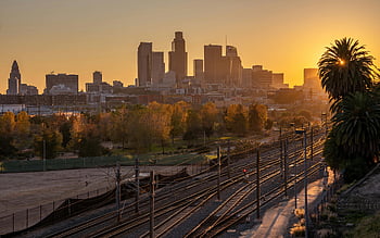 Los Angeles skyline, sunset, city buildings, downtown Los Angeles, rail tracks, palm trees, scenic view, urban landscape, sunset cityscape, California, cityscape photography