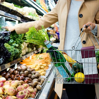 woman shopping, fresh produce, supermarket, grocery basket, selecting vegetables, grocery shopping, market, fresh vegetables, shopping cart, supermarket produce, grocery store