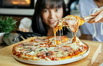 pizza, women, tomatoes, cheese, cheesy pizza, toppings, hot pizza, fresh pizza, oven, serving pizza, delicious pizza