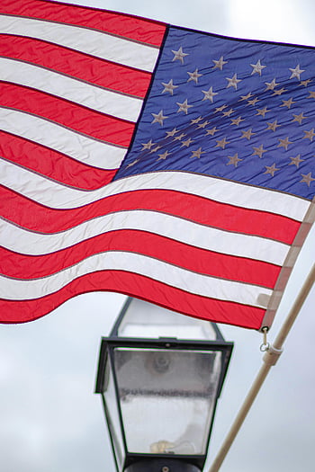 bandiera USA, bandiera americana, sventolando una bandiera, lampione, patriottismo, Annapolis MD, avvicinamento, stelle e strisce, asta portabandiera, scena all'aperto, simbolo nazionale