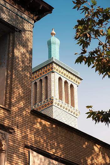 Persian architecture, historical architectural tower, Tehran Iran, traditional architecture, Islamic architecture, decorative tower, Middle Eastern architecture, historical building, cultural landmark