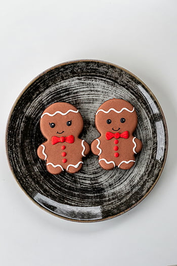 peberkager, sort keramisk plade, sød peberkage, mørk keramisk tallerken, Set ovenfra, Feriekager, Festlige cookies, peberbrød mænd, Dekorative cookies, søde godbidder, julekager