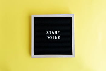 motivational text, frame, black message board, start doing, bright yellow background, inspiration, motivational quote, inspirational message, yellow background, text in frame, motivational board