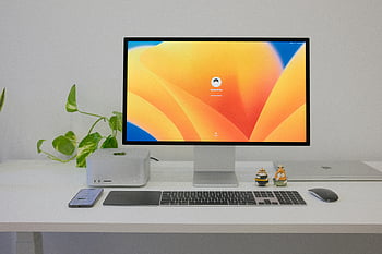 Apple Computer, Large Display, White Desk, modern office desk, tech gadgets, clean desk, organized desk, computer setup, office decor, keyboard, mouse