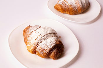 pastries, croissants, powdered sugar, white plates, freshly baked, perfect breakfast, breakfast pastries, croissant plates, dusted croissants, white plate pastries, breakfast croissants