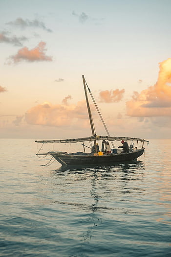fishing boat, sunrise, fishermen, calm ocean, casting nets, early morning, water, people, boat, ocean backdrop, sky
