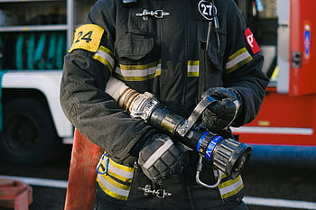 firefighter, protective gear, hose nozzle, ready for action, fireman, fire truck, emergency response, firefighting equipment, safety gear, fire department, fire hose
