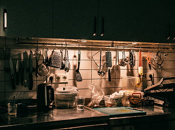 kitchen counter, utensils on hooks, well-equipped kitchen, hanging utensils, kitchenware, backsplash, Istanbul kitchen, kitchen tools, cooking equipment, kitchen organization, kitchen decor