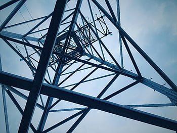 electricity pylon, low angle view, steel tower, clear sky, power lines, infrastructure, transmission tower, utility pole, industrial structure, sky background, steel construction