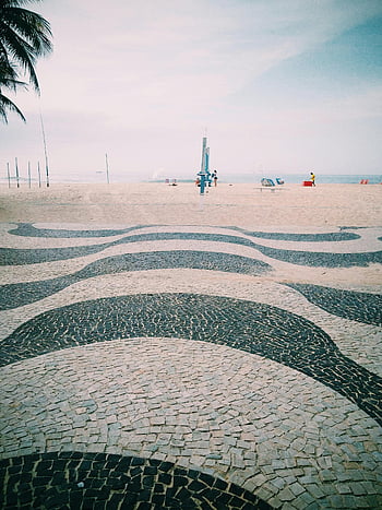 Copacabana Beach, Rio de Janeiro, mosaic pattern, summer travel, iconic view, people near shore, beach walkway, travel inspiration, seaside mosaic, beachfront mosaic, summer destination