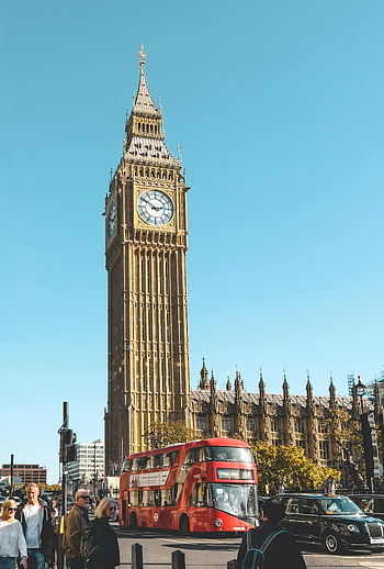 Big Ben, clock tower, blue sky, red double decker bus, sunny day, London, England, Palace of Westminster, iconic landmark, tourist attraction, cityscape