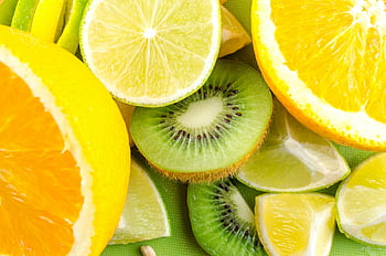 szeletelt kivi, citrom, narancs, friss gyümölcsök, élénk színek, citrusfélék, közeli fotó, kiwi szeletek, citrom szeletek, narancs szelet, gyümölcs textúrák