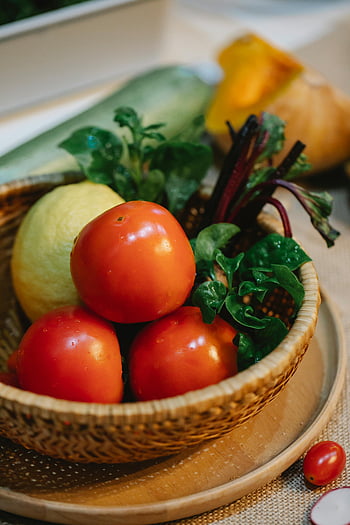 fresh vegetables, herbs, lemon, woven bowl, vibrant display, natural ingredients, tomatoes, citrus, fresh wet, healthy food, organic produce